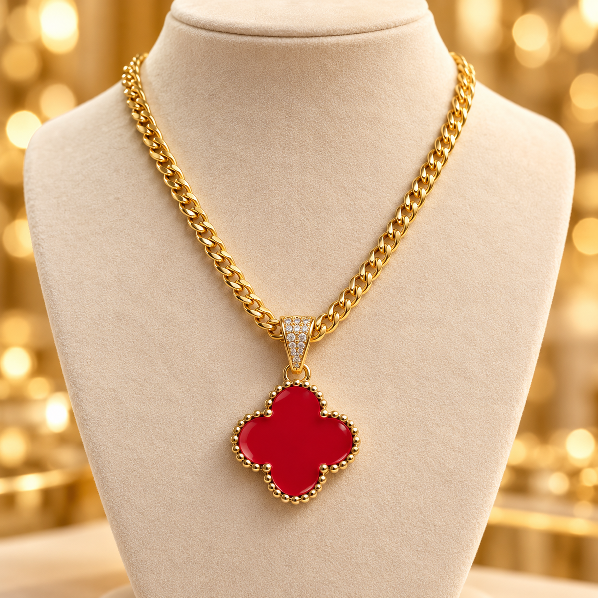 Cadena de 18 pulgadas con dije trébol rojo en oro laminado 14k
